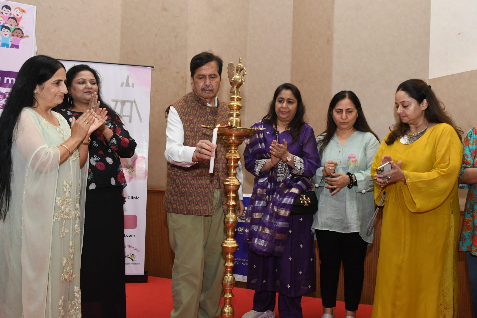 Minister lighting the ceremonial lamp to inaugurate the Special Hangout Flea Market